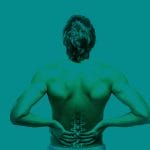 Person with low back pain receiving physiotherapy treatment for pain relief and improved mobility in the UK